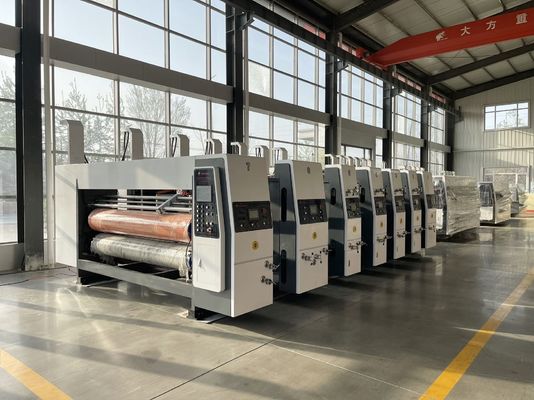180000 KG Αυτοματοποιημένη υψηλής ταχύτητας κυψέλη Flexo τετραχρωματικός εκτυπωτής Diecutter Shacker